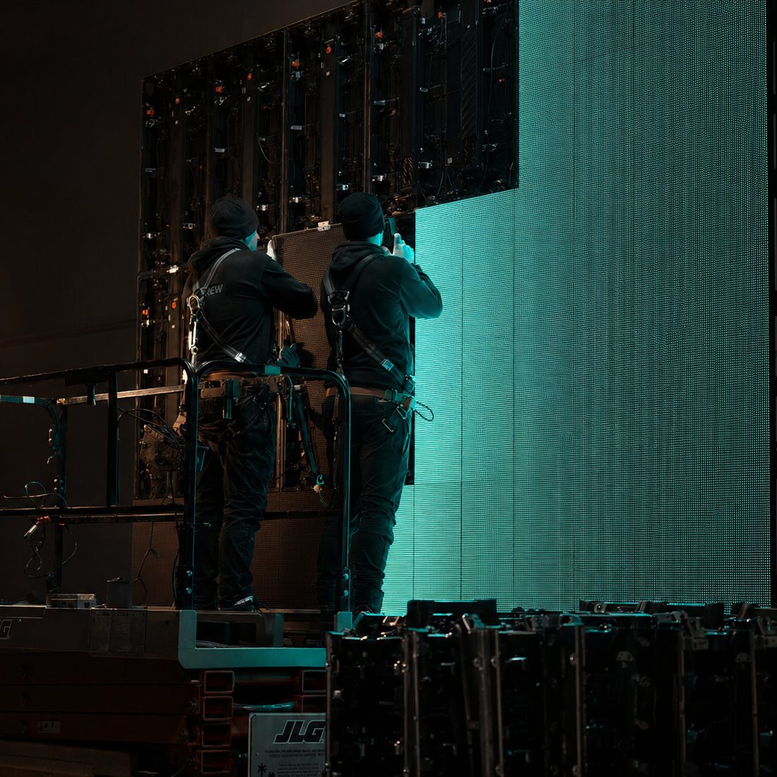 Technicians installing an LED video wall